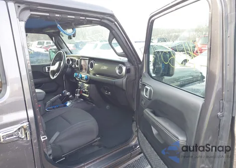 2022 Jeep Wrangler Unlimited Sahara 4X4 z USA, uszkodzony, nr VIN 1C4HJXEG1NW254559